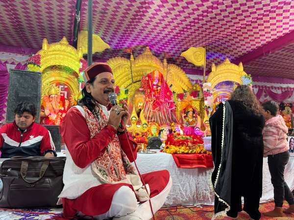 Prem Bhatnagar ji singing seated before the darbar at a Mata Ki Chowki / Jagran